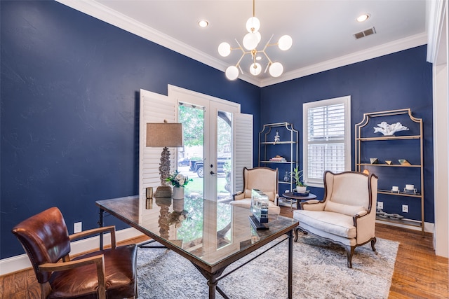 home office with ornamental molding, a chandelier, french doors, and hardwood / wood-style flooring