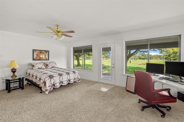 bedroom featuring access to exterior, carpet flooring, and ceiling fan