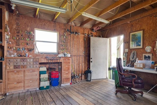 interior space with hardwood / wood-style floors and a workshop area