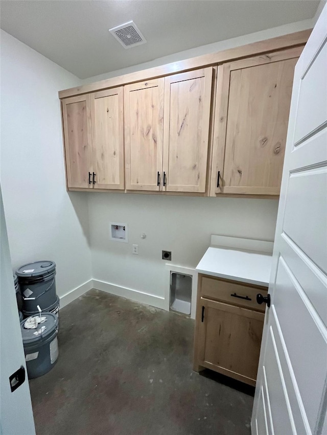 laundry area featuring cabinets, hookup for an electric dryer, and washer hookup