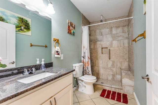 bathroom featuring tile patterned flooring, vanity, toilet, and a shower with curtain