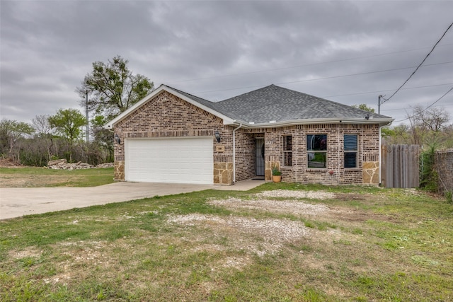 ranch-style house with a garage and a front lawn