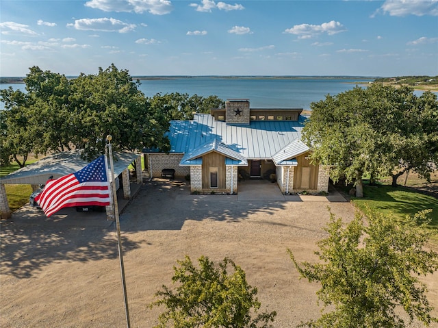 exterior space with a water view