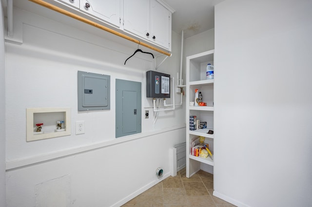 clothes washing area with cabinets, washer hookup, electric panel, and electric dryer hookup