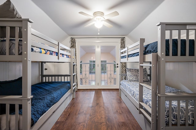 bedroom featuring dark hardwood / wood-style floors, ceiling fan, and lofted ceiling