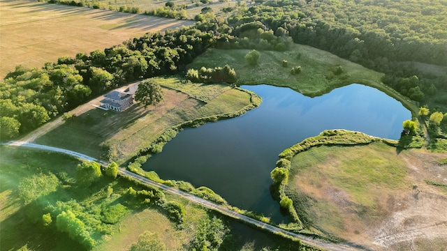 birds eye view of property featuring a water view and a rural view