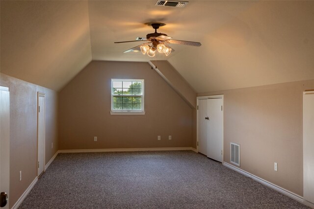 bonus room featuring ceiling fan, carpet floors, and vaulted ceiling