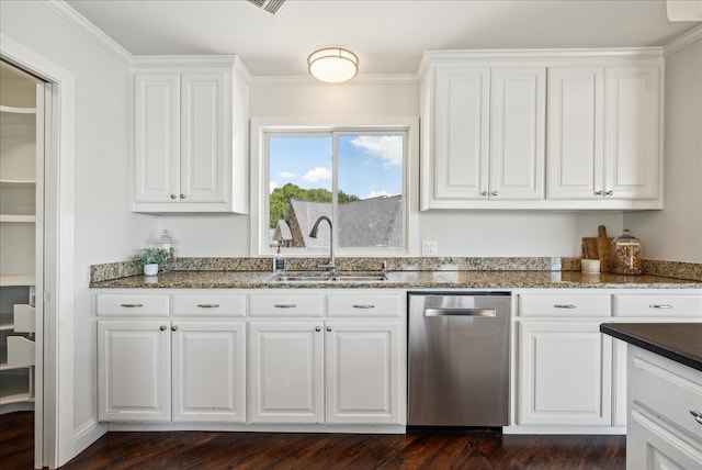 kitchen with dark wood-type flooring, white cabinets, and crown molding