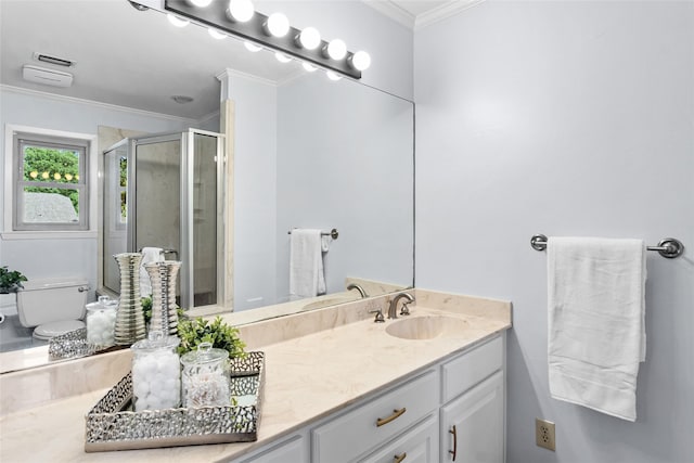 bathroom featuring a shower stall, vanity, and ornamental molding