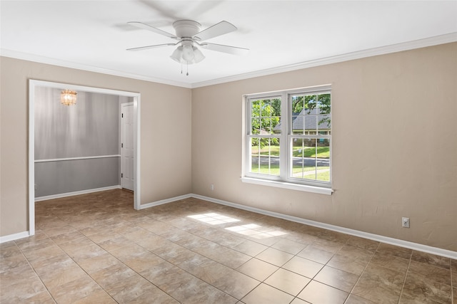 unfurnished room featuring ceiling fan, light tile patterned floors, and ornamental molding