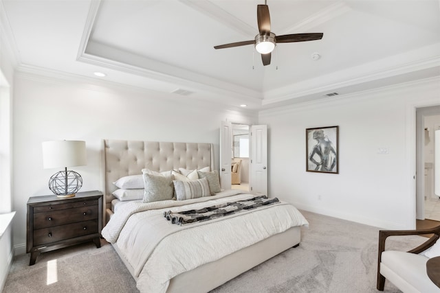 bedroom featuring crown molding, ceiling fan, and a tray ceiling