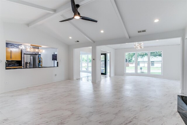 unfurnished living room featuring a chandelier, ceiling fan, recessed lighting, and a sink