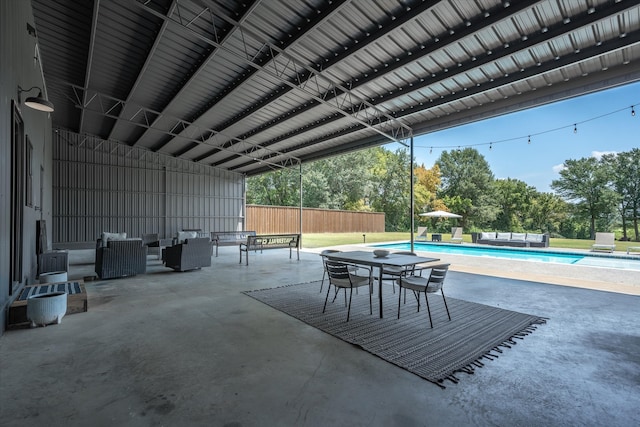 view of patio featuring a fenced in pool and an outdoor hangout area