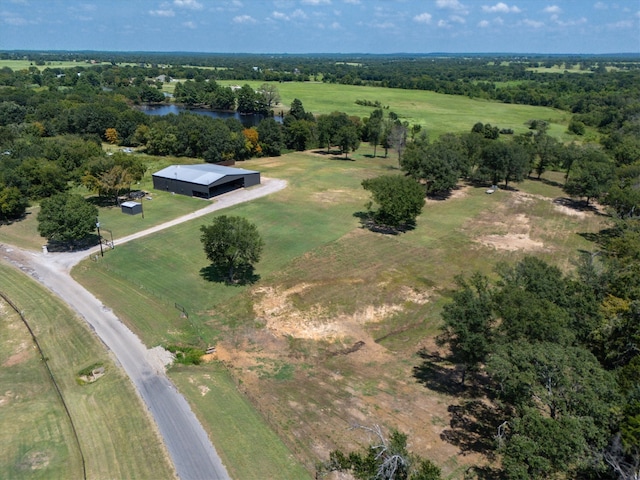 bird's eye view with a water view and a rural view