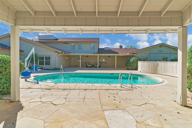 view of pool featuring a patio