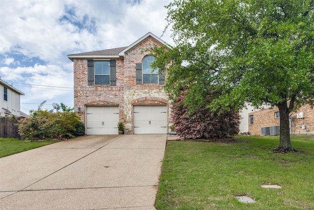 traditional home featuring concrete driveway, brick siding, an attached garage, and a front lawn