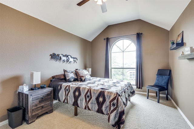 bedroom with ceiling fan, light carpet, and lofted ceiling