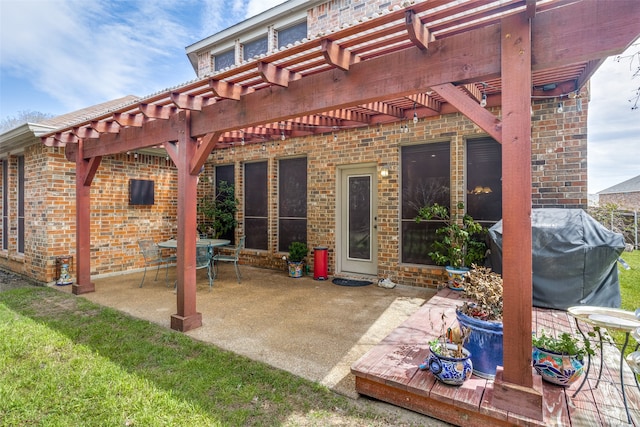 exterior space with area for grilling, a pergola, and a deck