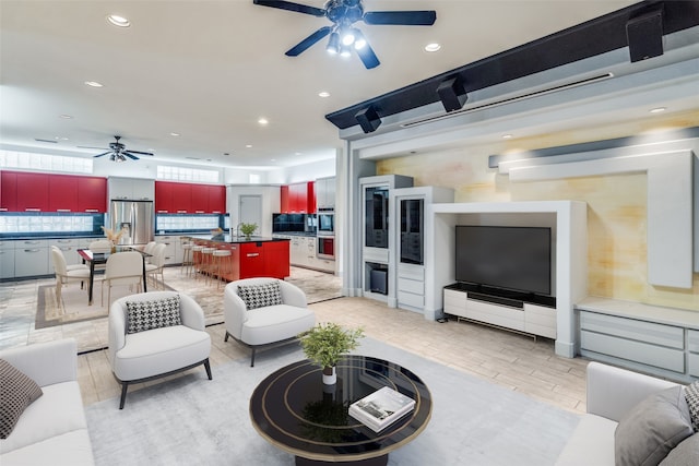 living room featuring ceiling fan