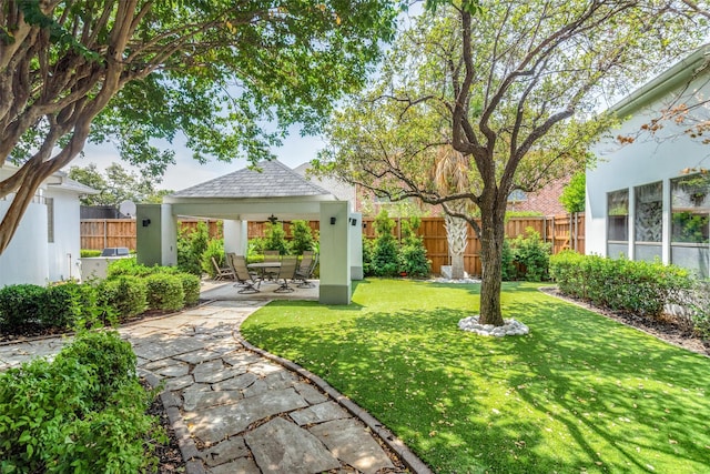 view of yard with a gazebo and a patio