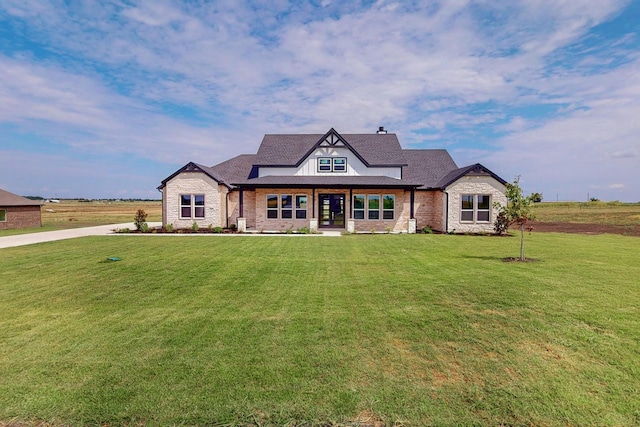 view of front facade with a front lawn