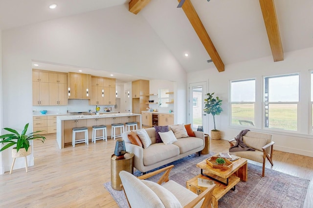 living room with high vaulted ceiling, light wood-type flooring, wine cooler, and beamed ceiling