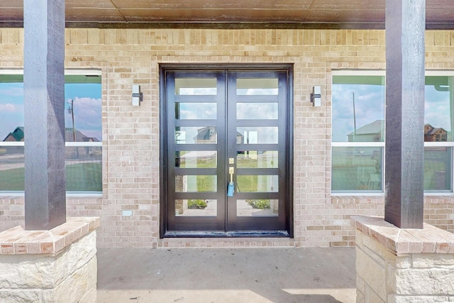 doorway to property featuring french doors