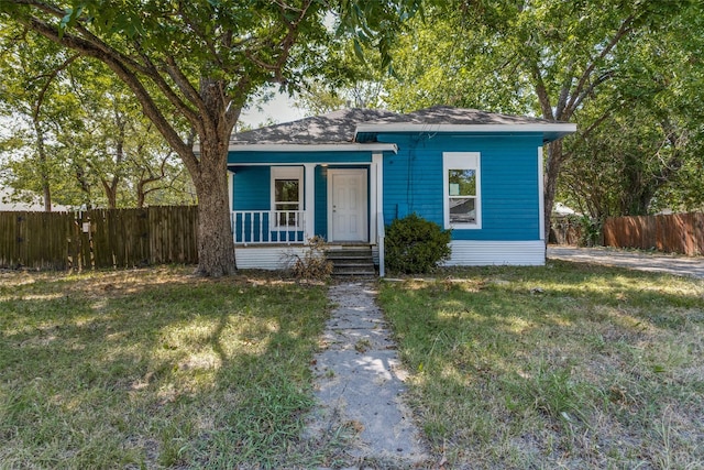 view of front of home featuring a front lawn and a porch