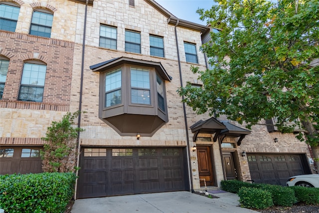 view of front of property with a garage