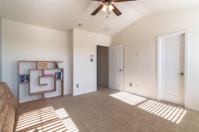 interior space featuring lofted ceiling and ceiling fan