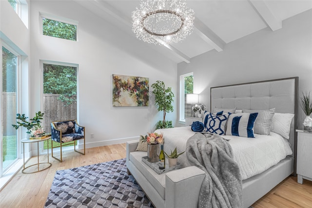 bedroom featuring high vaulted ceiling, hardwood / wood-style flooring, beamed ceiling, and a chandelier