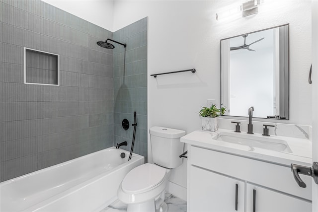 full bathroom with vanity, toilet, and tiled shower / bath combo