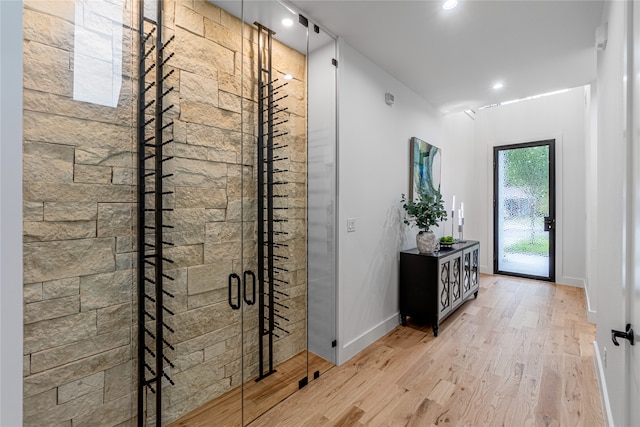 wine room featuring hardwood / wood-style flooring