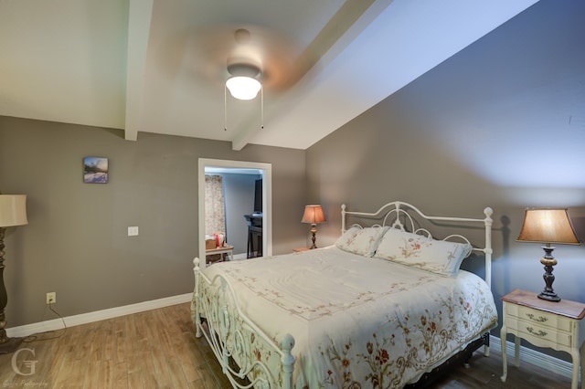 bedroom featuring ceiling fan and hardwood / wood-style flooring