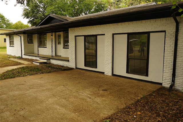 back of house featuring a patio