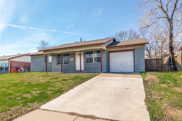 single story home with a garage and a front lawn