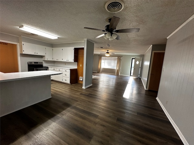 kitchen featuring white cabinets, electric stove, ceiling fan, and dark wood-type flooring