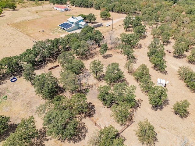 birds eye view of property with a rural view