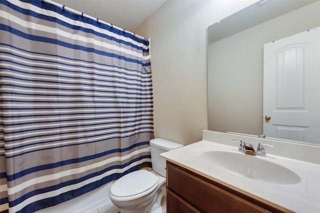 2512 Saldana Dr, Fate, TX 75189 - full bathroom with vanity, a shower with shower curtain, and a textured wall