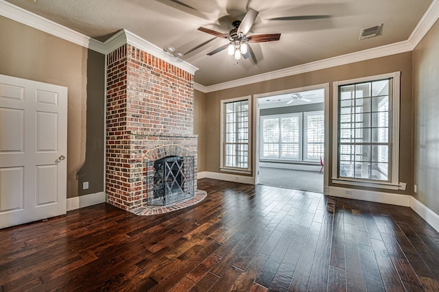 unfurnished living room featuring a fireplace, crown molding, dark hardwood / wood-style flooring, and ceiling fan