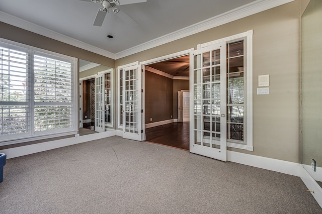 unfurnished room with french doors, ceiling fan, wood-type flooring, and ornamental molding