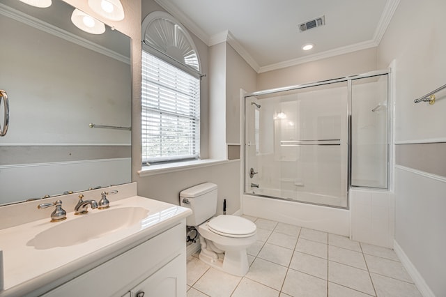 full bathroom with enclosed tub / shower combo, crown molding, tile patterned floors, toilet, and vanity