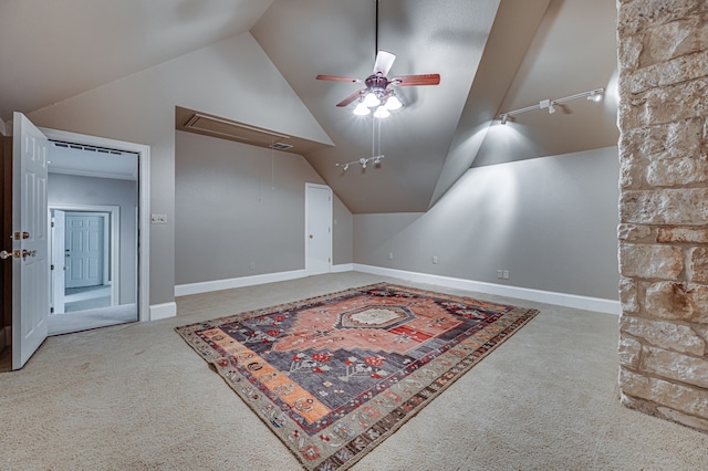 additional living space with carpet, ceiling fan, and vaulted ceiling