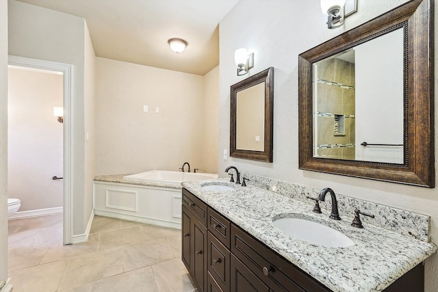 bathroom with toilet, a bathing tub, and vanity