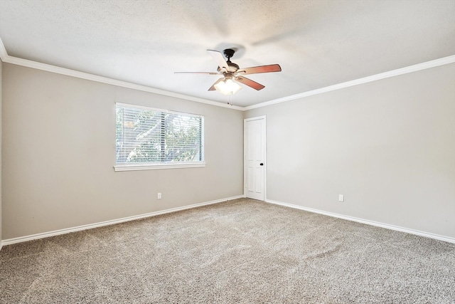 carpeted spare room with crown molding, a textured ceiling, and ceiling fan