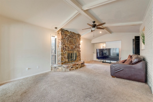 living room with carpet, ceiling fan, and a fireplace