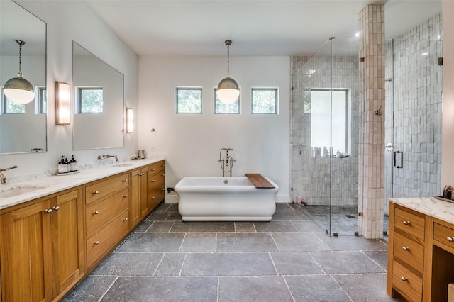 bathroom with separate shower and tub and vanity