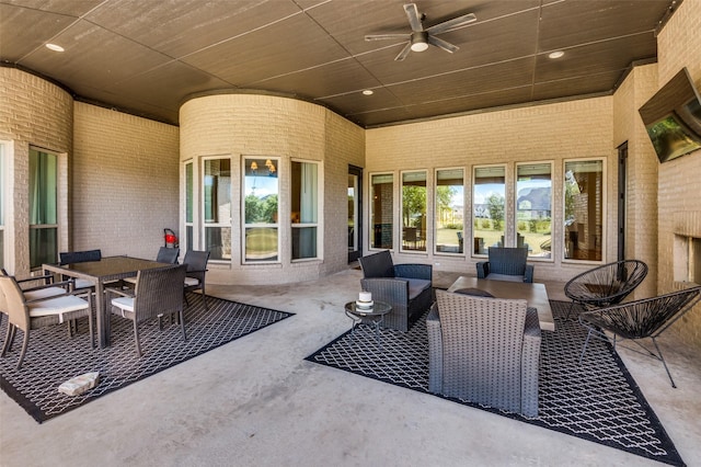 view of patio featuring ceiling fan