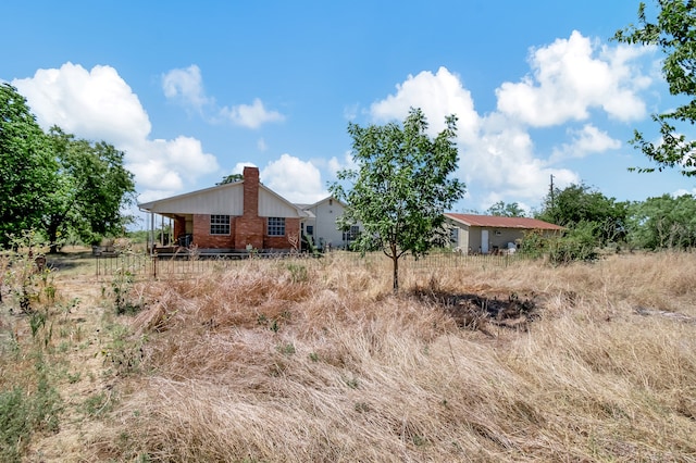 exterior space featuring a chimney