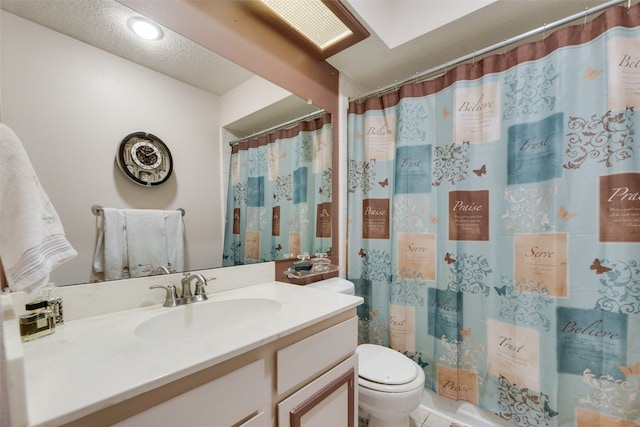 bathroom featuring a shower with shower curtain, vanity, toilet, and tile patterned flooring